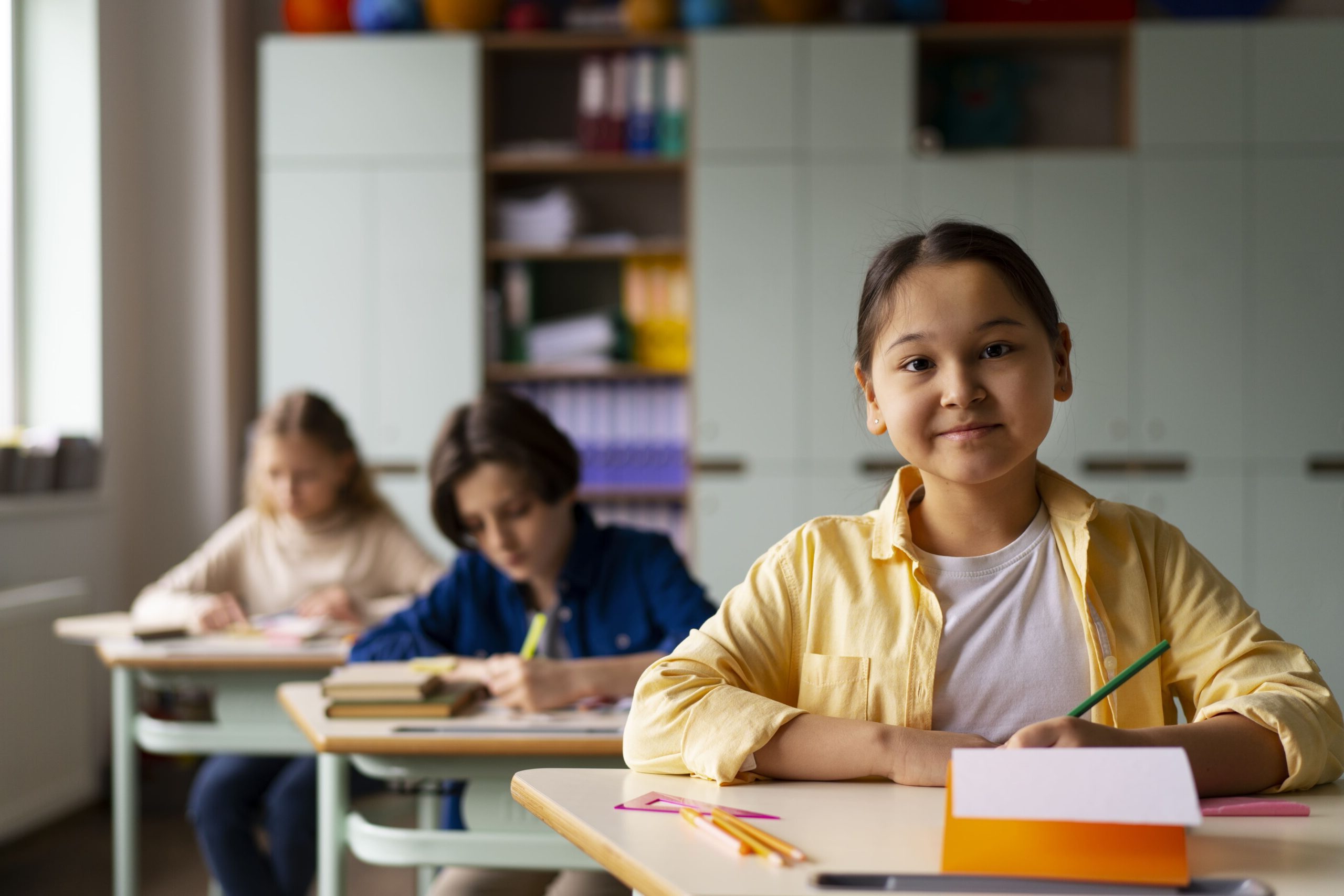 front-view-kids-cheating-school (1)